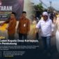Diiringi ribuan pendukung, Acep Saepudin resmi mendaftarkan diri sebagai calon Kepala Desa Kertajaya, Kecamatan Pebayuran, Kabupaten Bekasi, Kamis (6/8/2026).